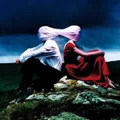 Casually dressed & deep in conversation